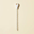 SwiftFix Flexible Drain Hair Remover on a cream studio background