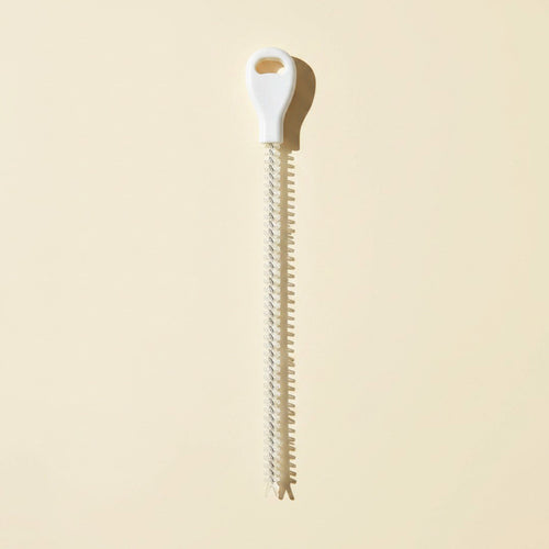 SwiftFix Flexible Drain Hair Remover on a cream studio background