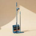 SwiftFix Foldable Broom and Dustpan Set on a cream studio background